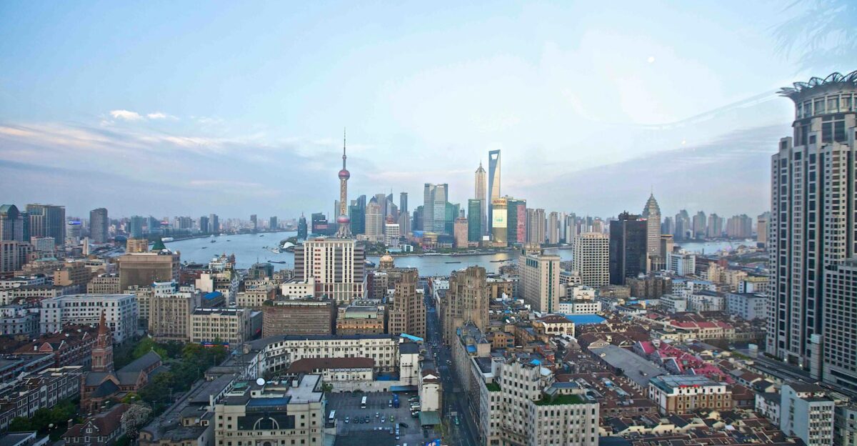 A breathtaking view of Shanghai s skyline featuring iconic skyscrapers and the Huangpu River
