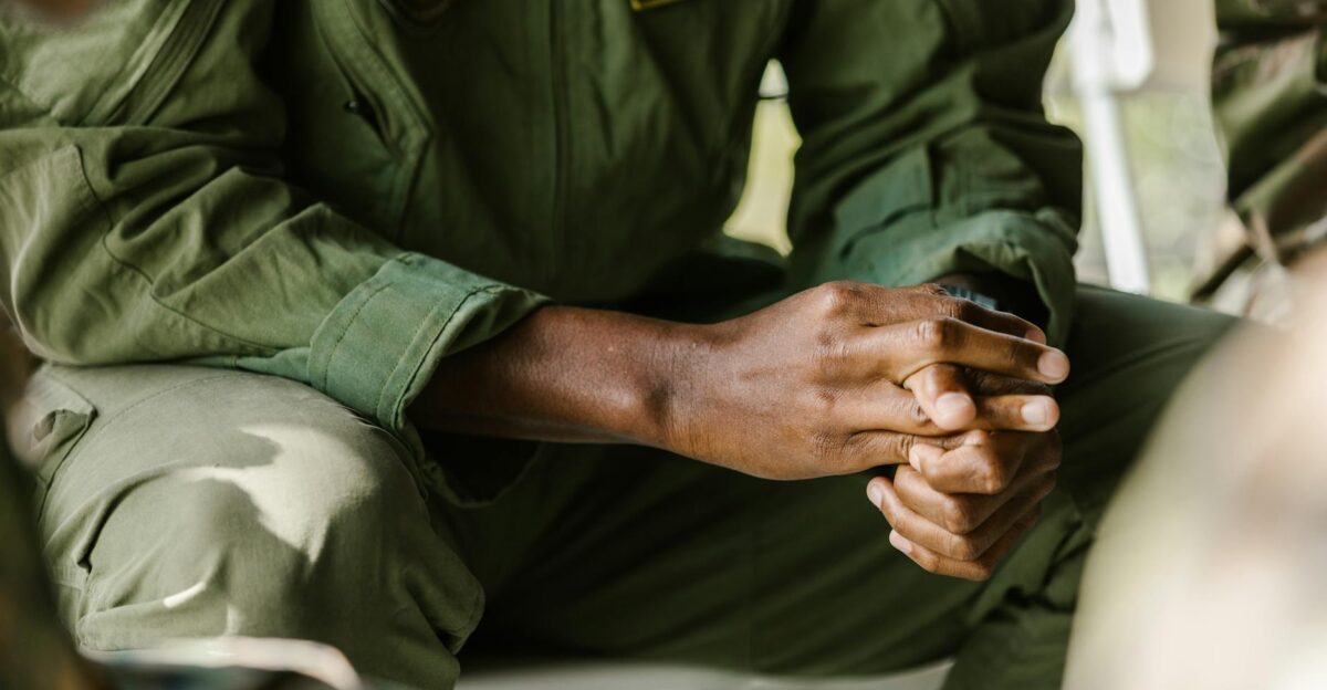 Focused image of a soldier s hands in uniform symbolizing military pride and service