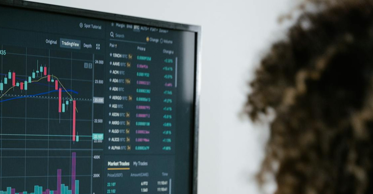 Detailed view of a financial analysis chart on a monitor with cryptocurrency trading data