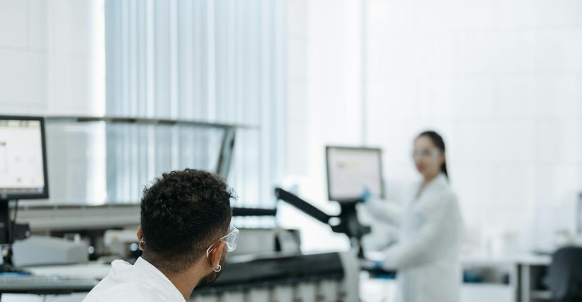Scientists working with lab equipment analyzing samples for research