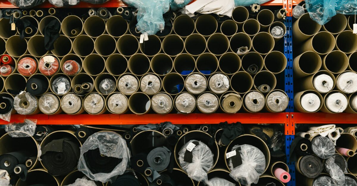 pile of garments on retailer gondola