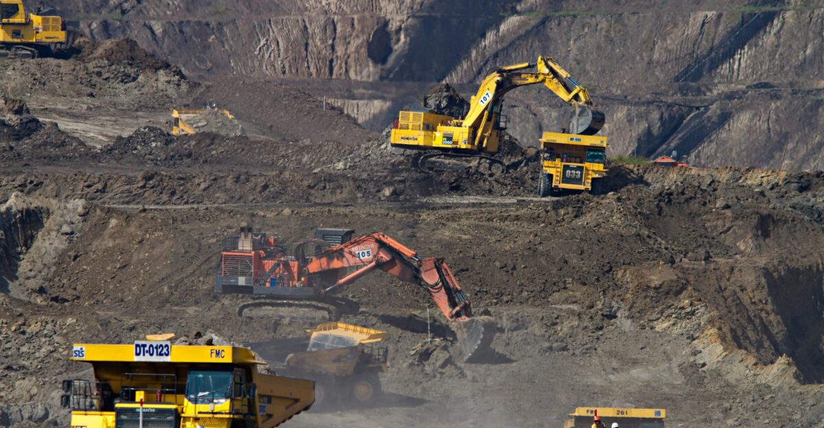 photography of excavators at mining area