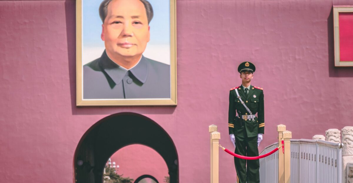soldier standing near photo frame