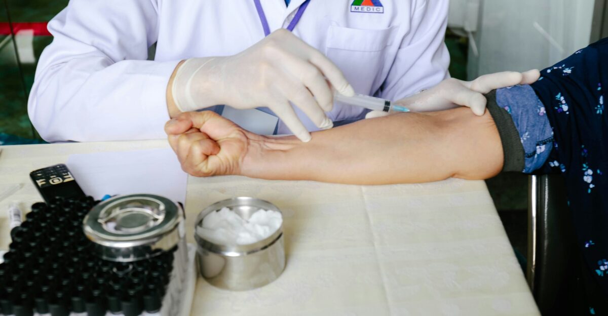 woman holding syringe
