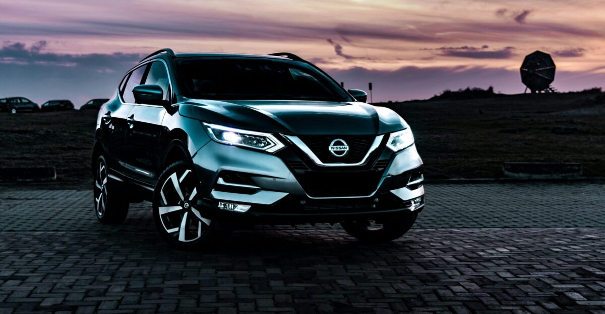gray Nissan Rogue SUV outdoor during nighttime