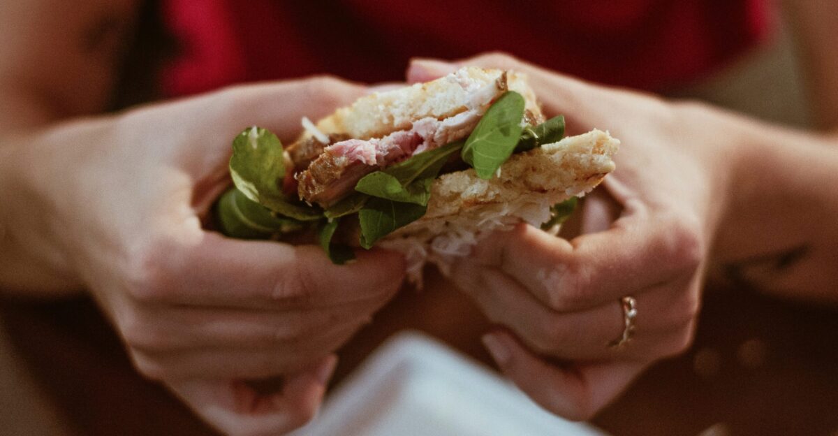 person holding cooked food