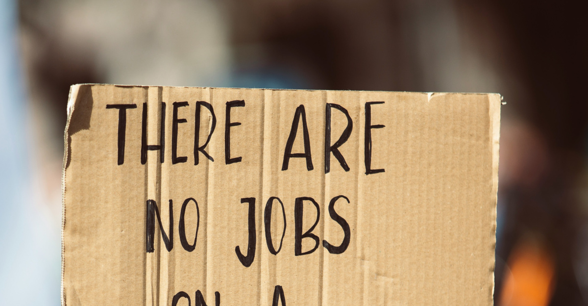 perosn holding signage