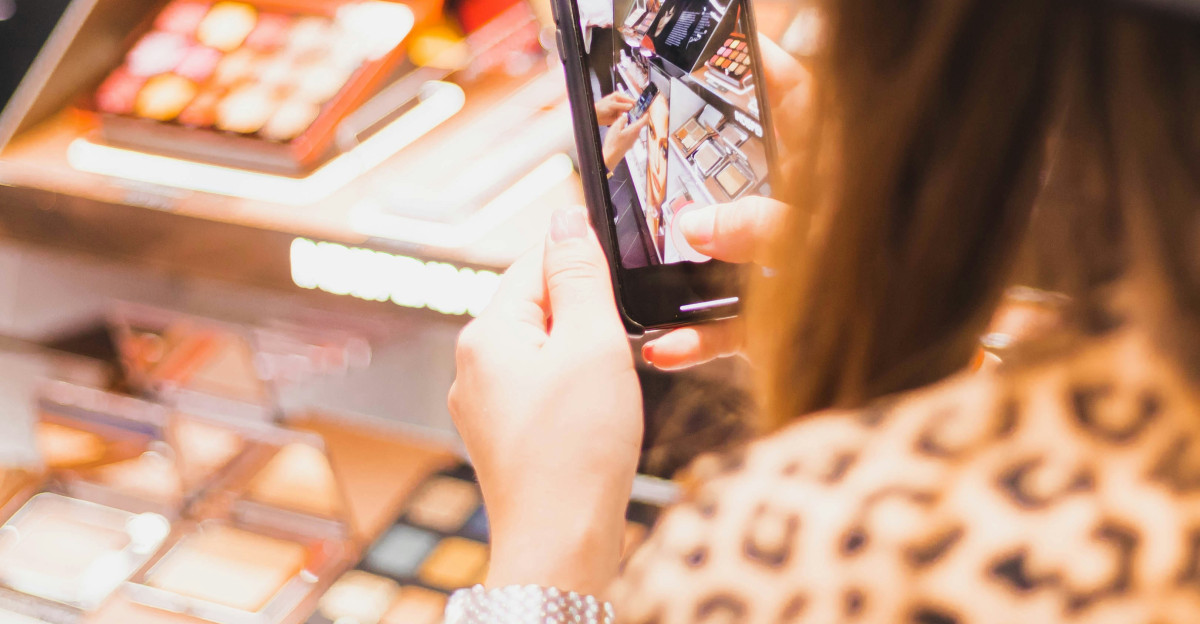 woman using black smartphone in macro photography