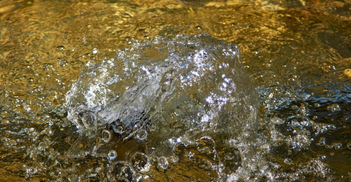water splash on brown sand