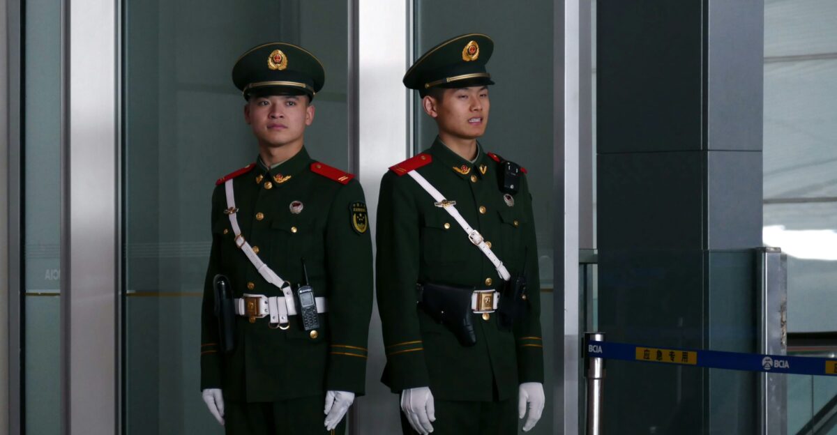 man in black and brown camouflage uniform