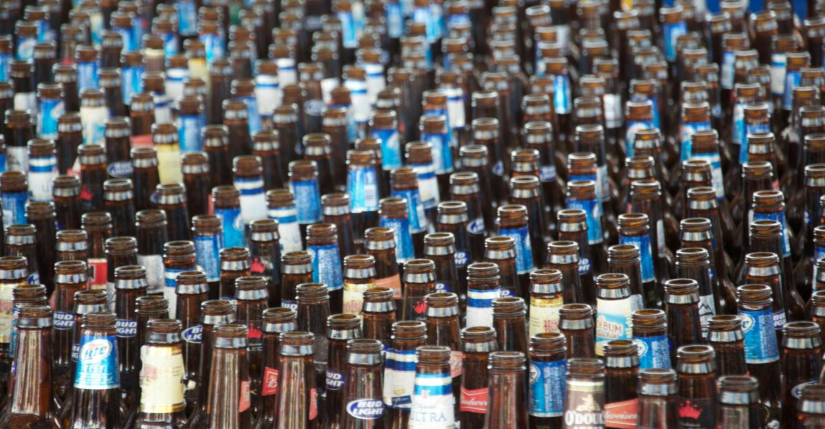 brown glass bottles on brown wooden table