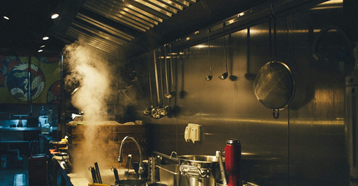 stainless steel cooking pots on stove