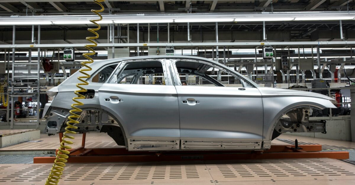 white sedan on a parking lot