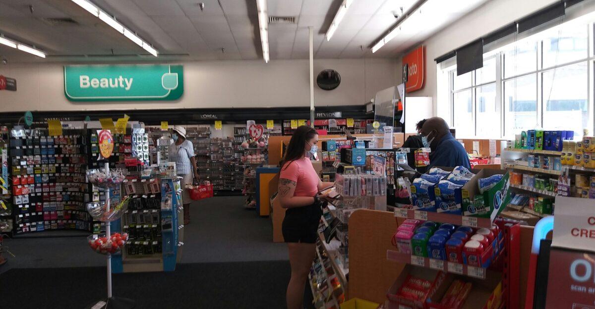 A store filled with lots of items and people