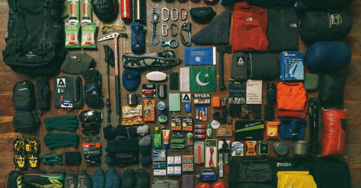 assorted items on black textile