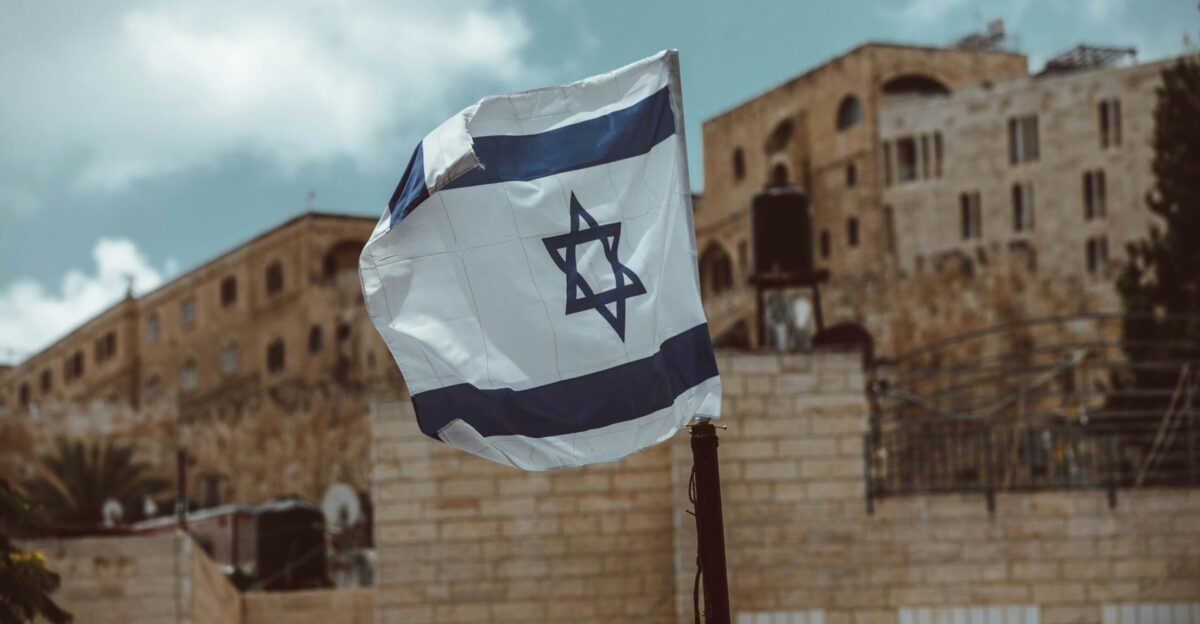 blue and white flag on pole