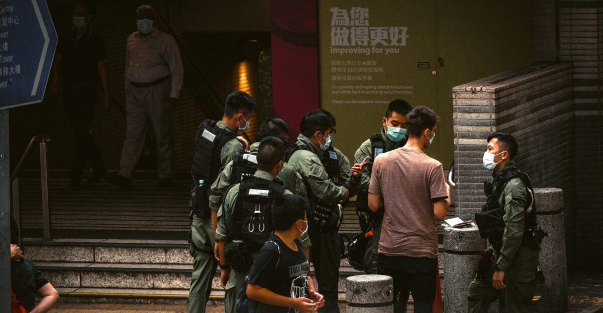 people walking on sidewalk during daytime