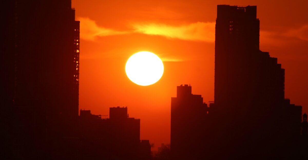 silhouette of city buildings during sunset