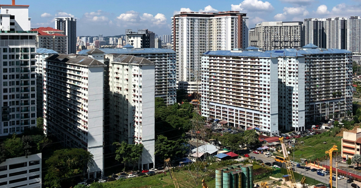 white and gray concrete buildings under blue sky during daytime
