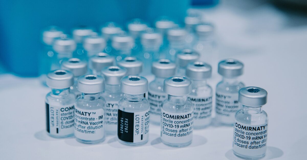 white and black labeled bottle