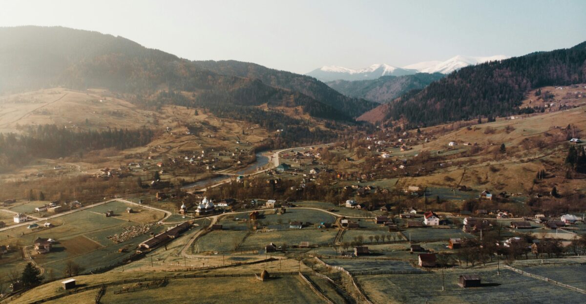 aerial view of city near mountains during daytime