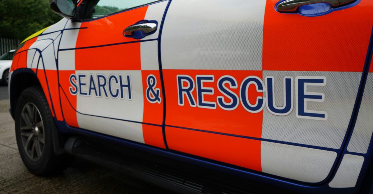 white orange and blue sedan