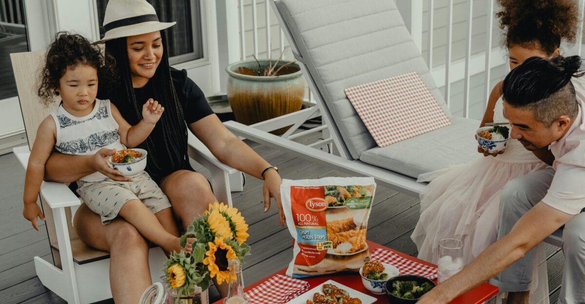 woman in black shirt sitting on chair
