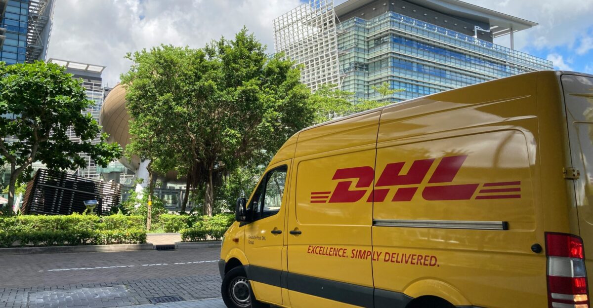 yellow van parked on sidewalk during daytime