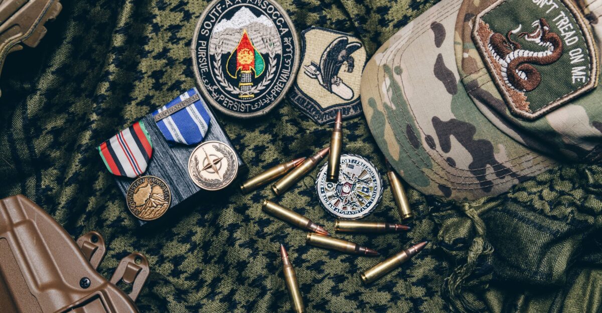 silver round coins on black textile