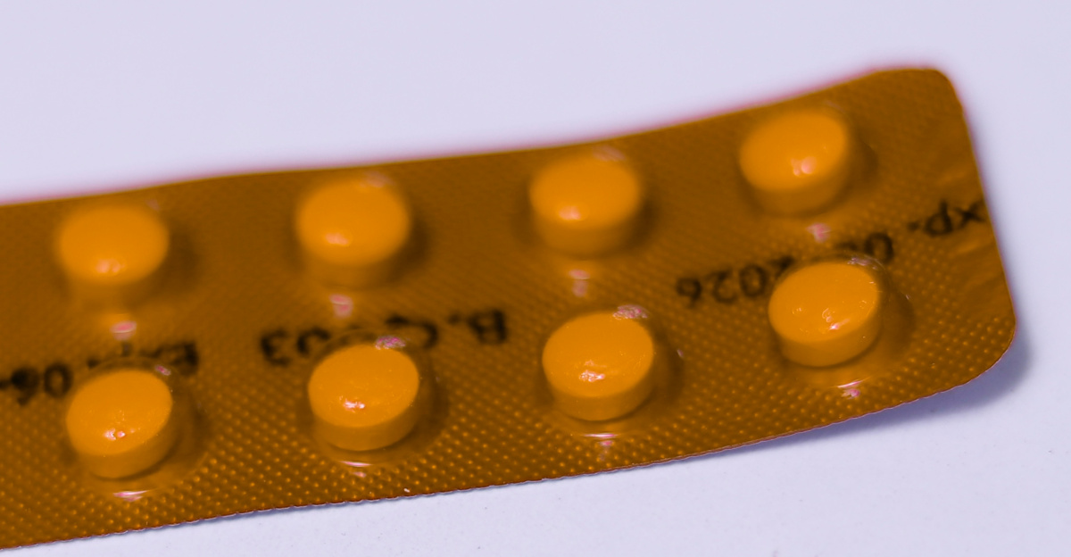 a yellow contraption sitting on top of a white table