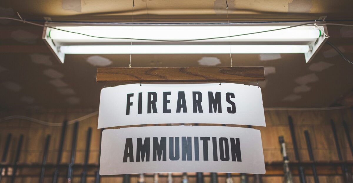 a sign that is hanging from a ceiling