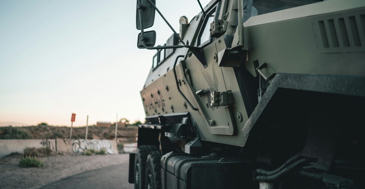 a military truck parked on the side of the road