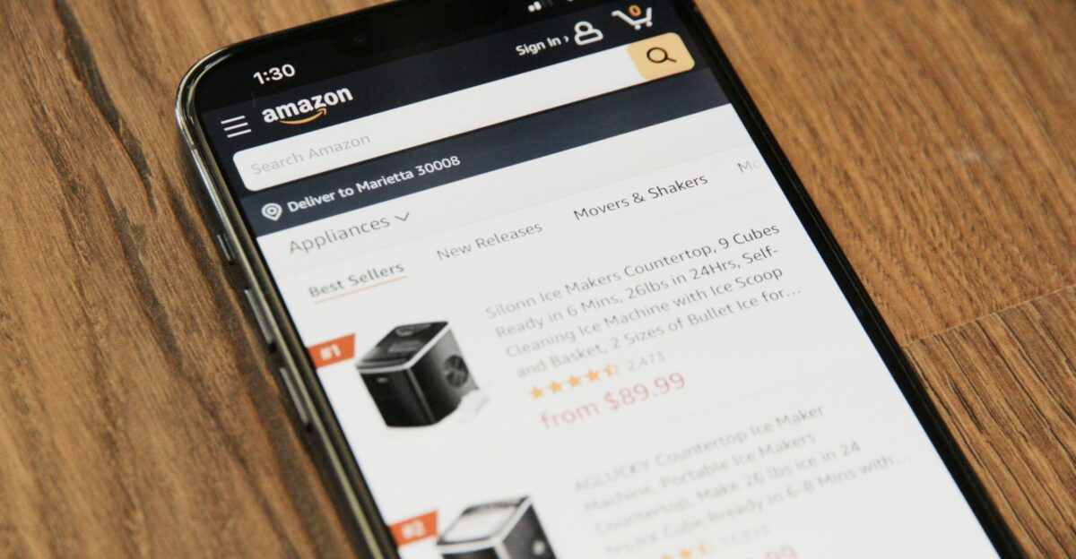 a cell phone sitting on top of a wooden table