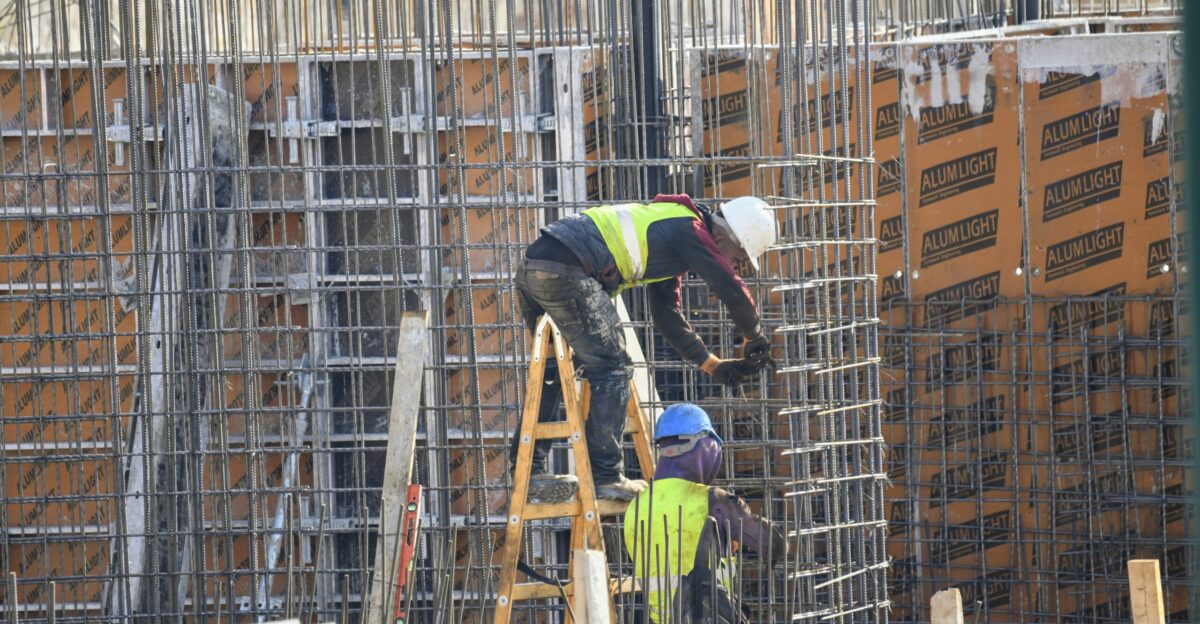 a group of men working on a construction site