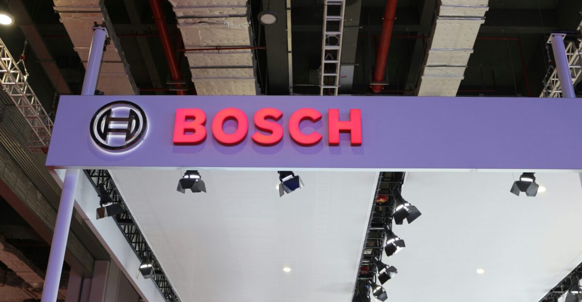 a purple sign that says bosch hanging from the ceiling