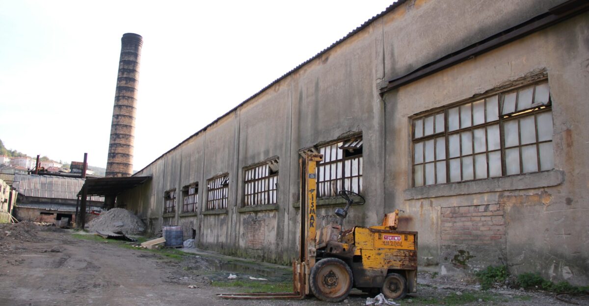 a large building with a large truck in front of it