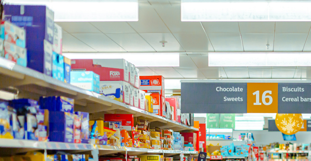 a grocery store aisle filled with lots of food