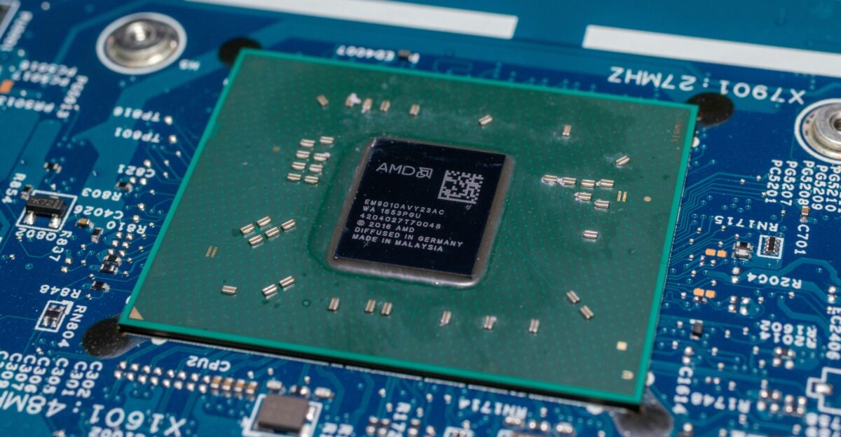 a close up of a cpu chip on top of a motherboard