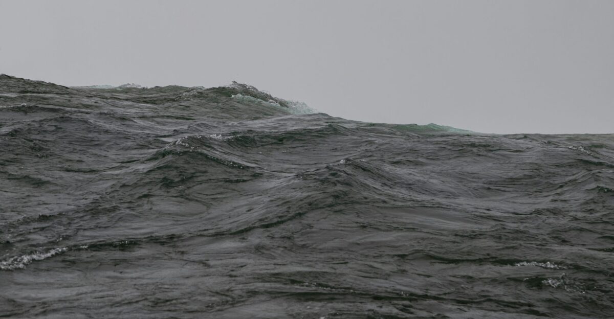 a large body of water with waves in it