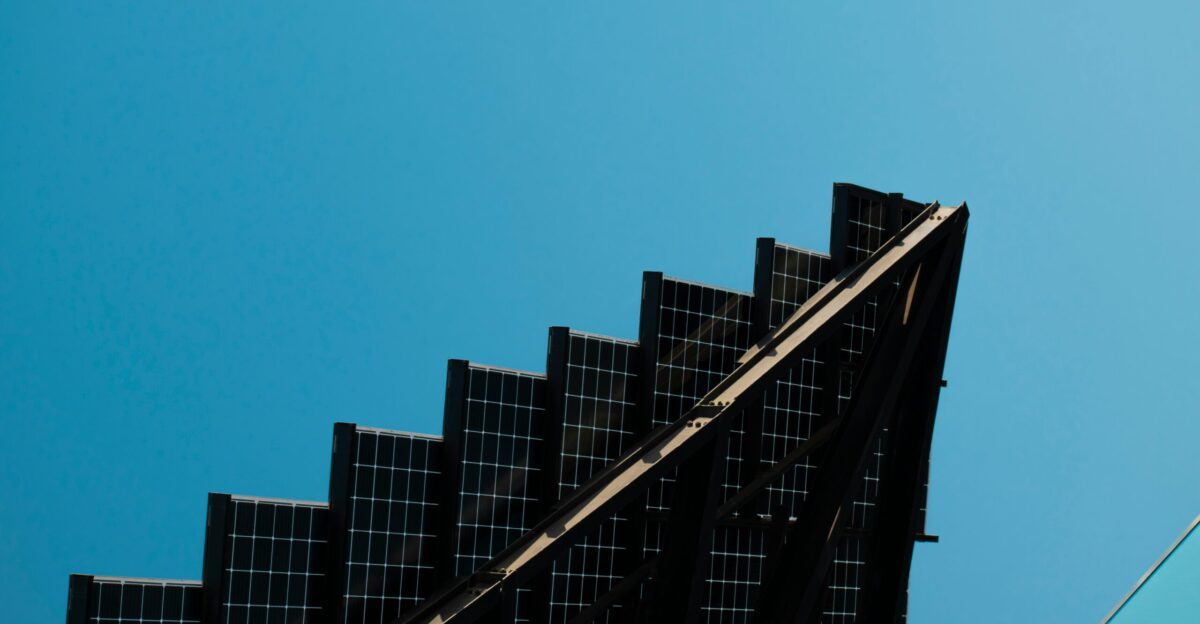 a very tall building with a sky background