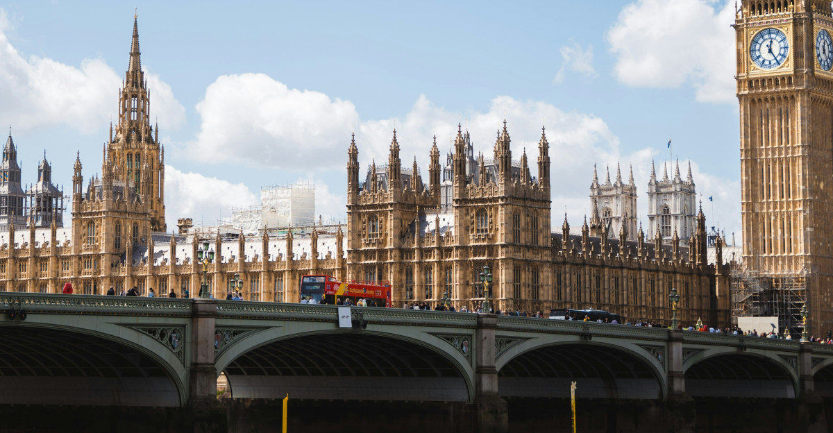 the big ben clock tower towering over the city of london