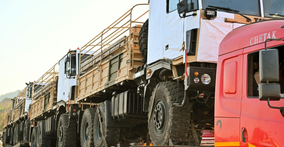 a row of trucks parked next to each other