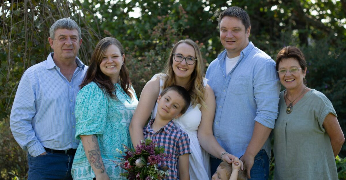 a group of people standing next to each other