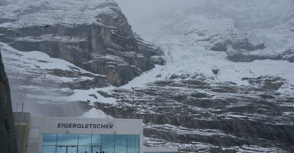 a group of people standing outside of a building