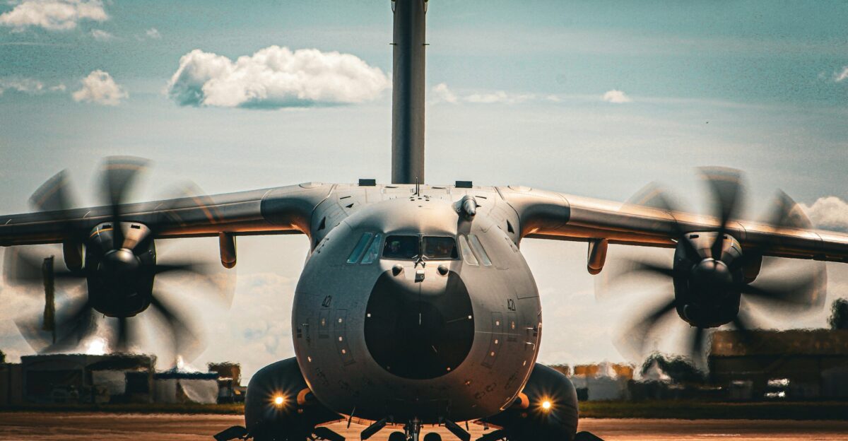 a large air plane sitting on top of an airport tarmac