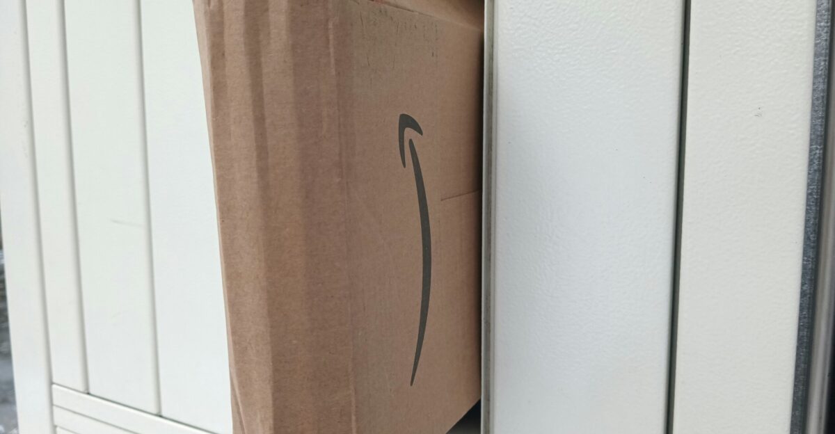 a brown cardboard box with an arrow drawn on it