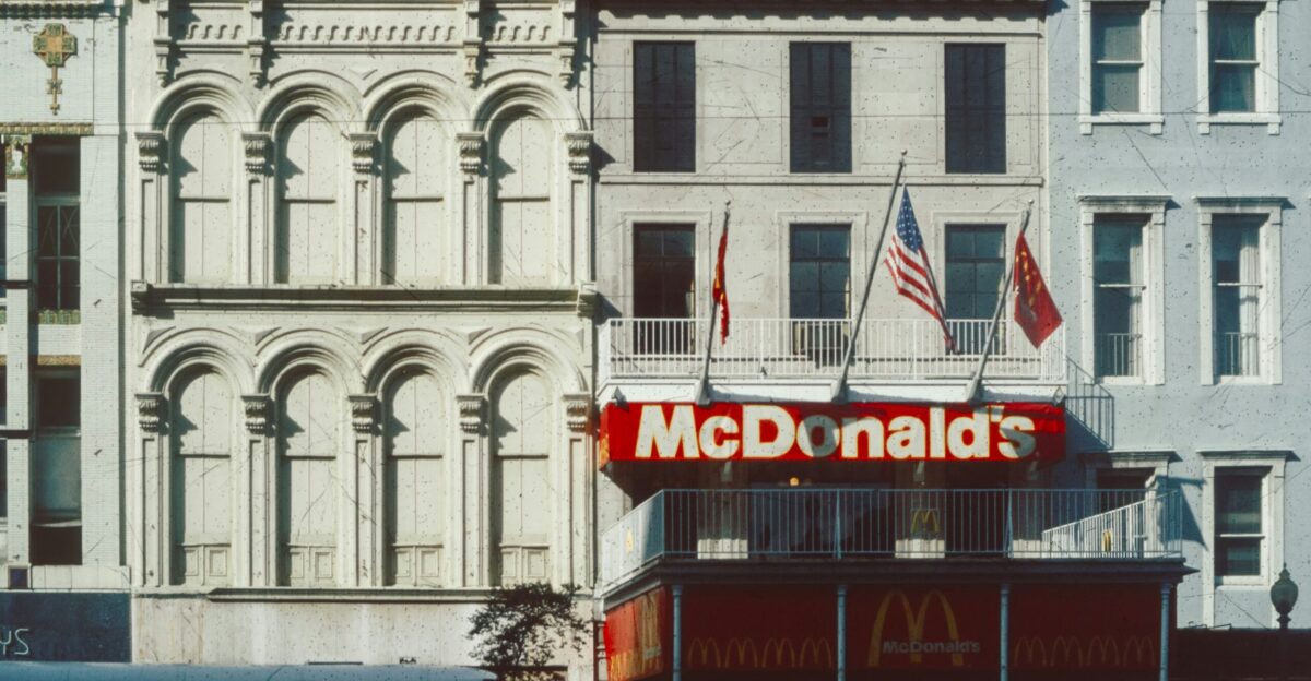 a mcdonald s restaurant in the middle of a city