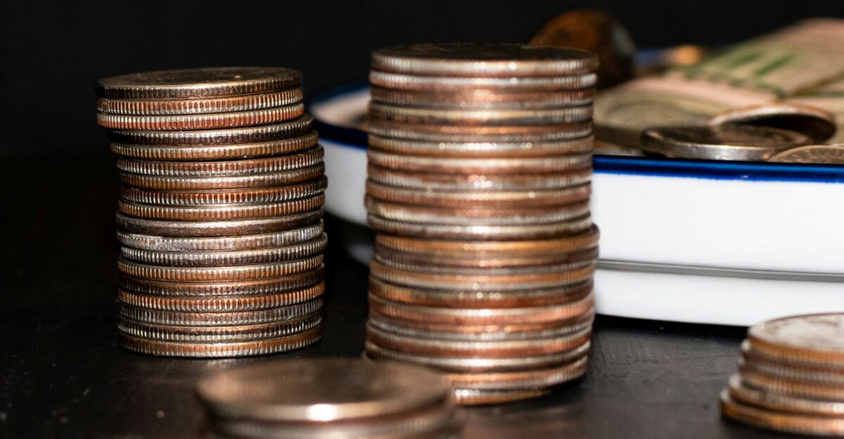 a pile of coins sitting on top of a table
