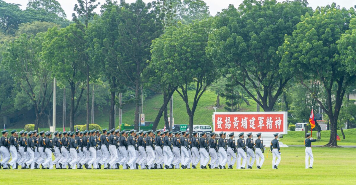 A group of men in uniforms standing in a line