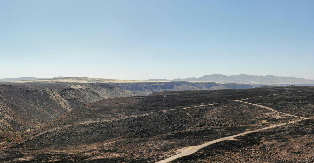 A view of a dirt road in the middle of nowhere